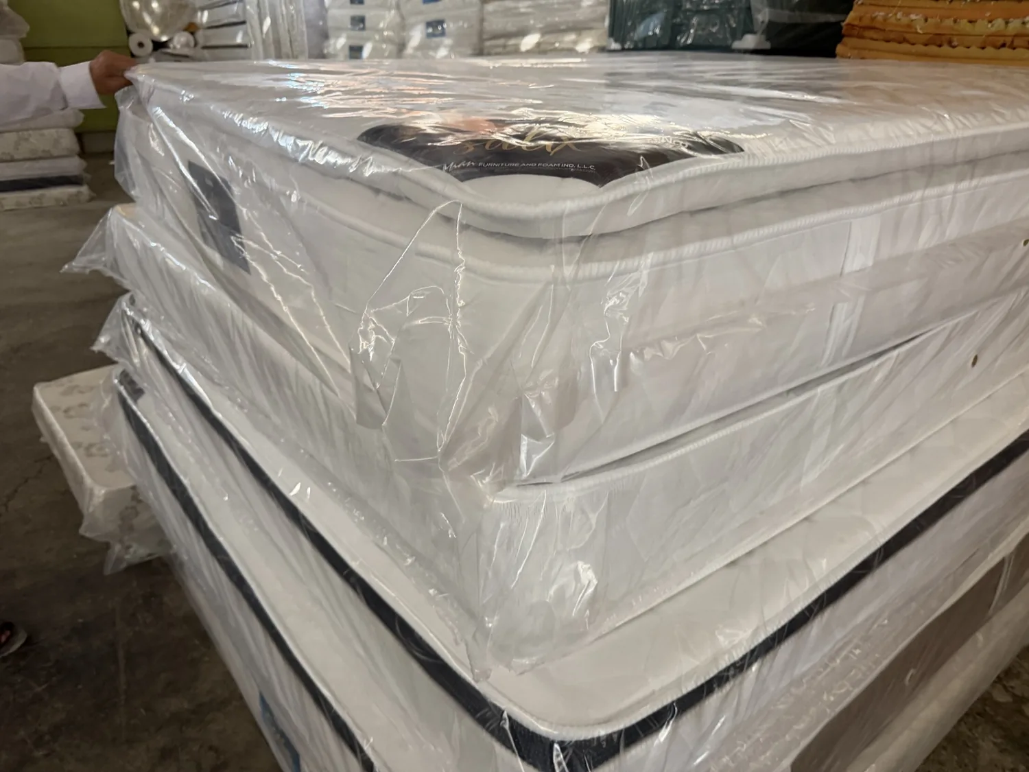 Real mattresses wrapped and ready in supplier stock